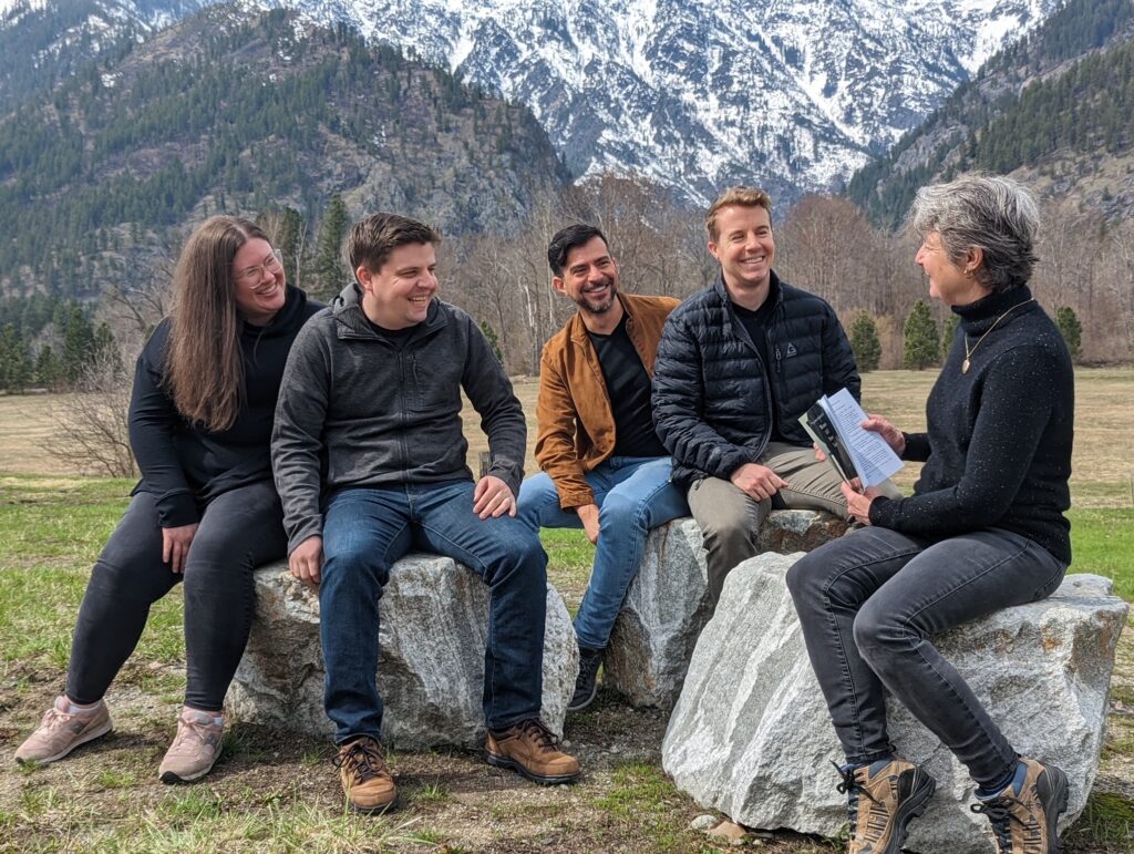 Karen Buley reading to family April 15, 2023 in Leavenworth, WA.