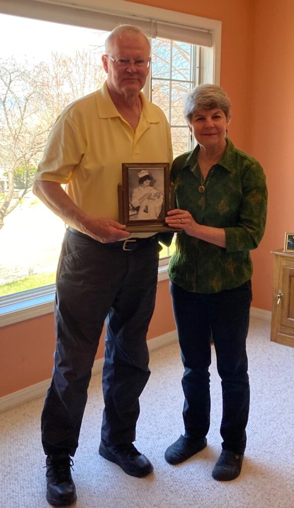 Chris Karlberg and Karen Buley with a precious, vintage photo and jewelry